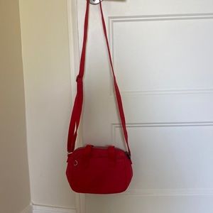 A red Kipling bag. Super cute and in amazing condition.